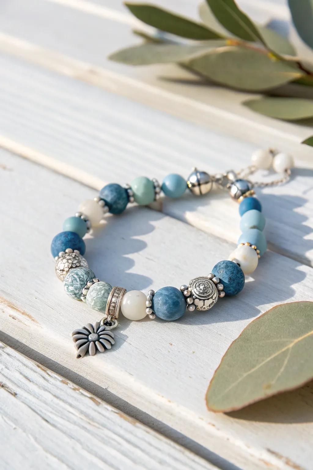 Capture the tranquility of the ocean with this breathtaking handmade clay bead bracelet, ideal for introducing a dash of coastal refinement to your style.