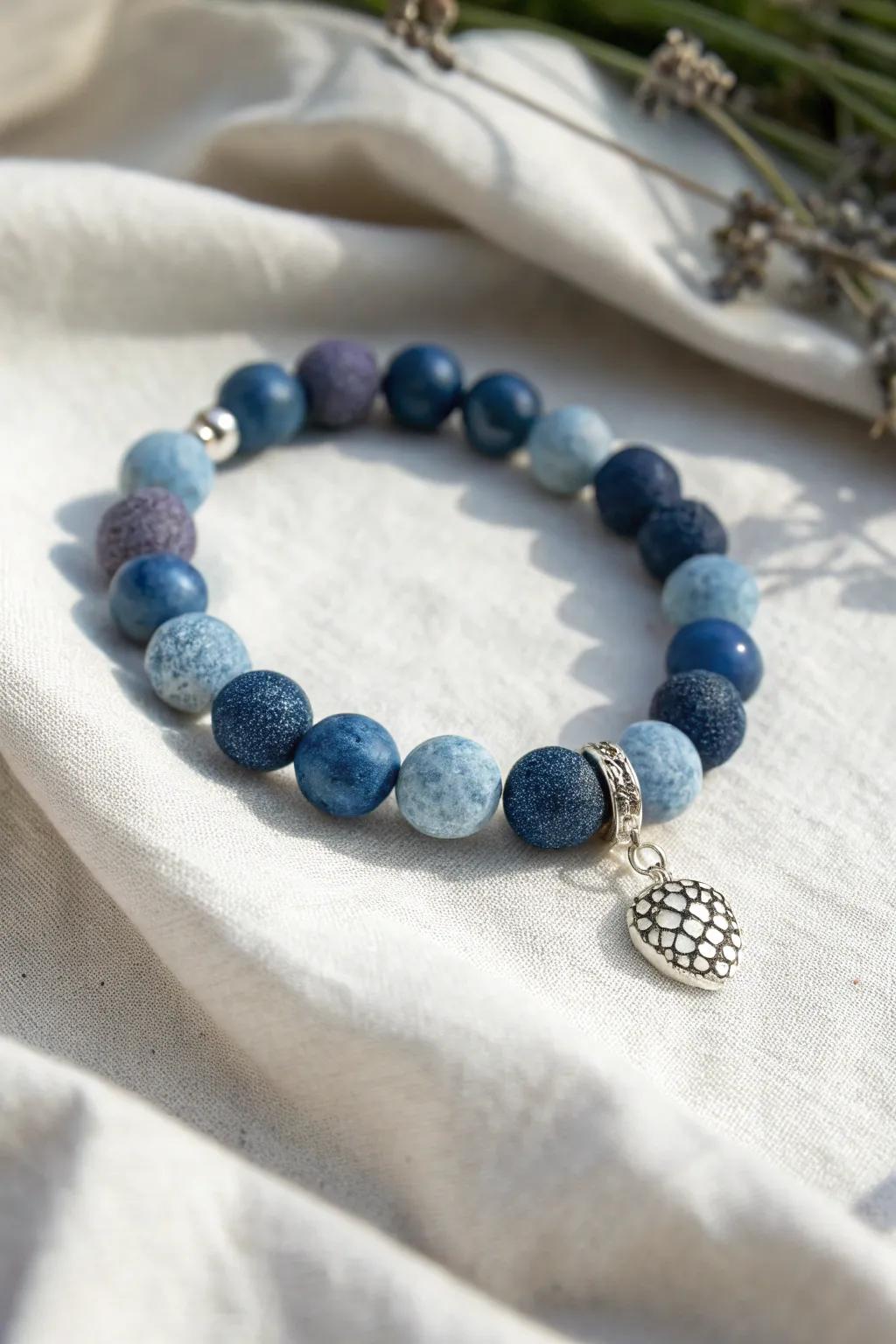 Capture the essence of summer with this Bilberry Delight clay bead bracelet, a flawless amalgamation of bohemian allure and Scandinavian minimalism.