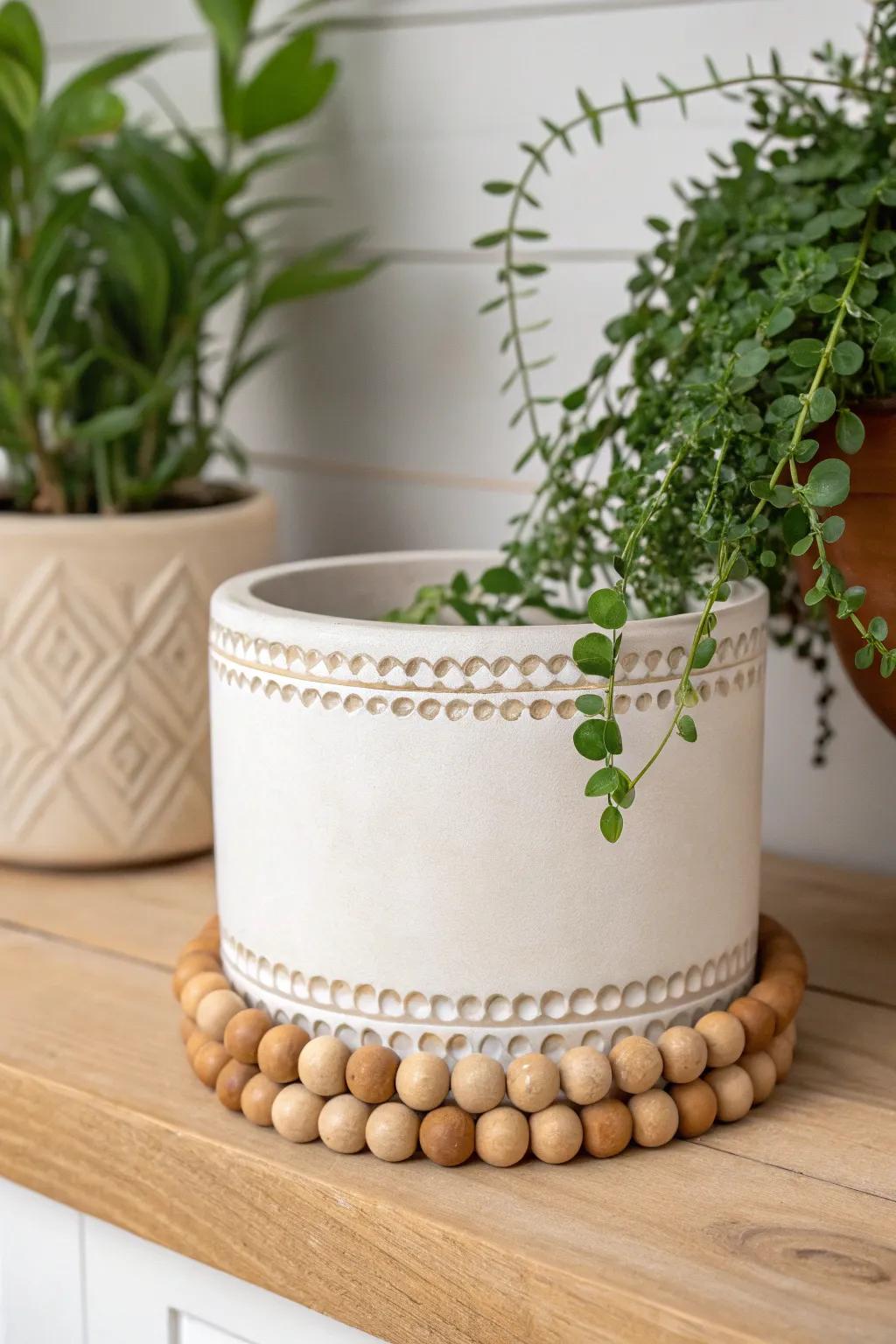 Enhance your plants with a hint of handcrafted sophistication: Bead-Detailed Garden Boxes.