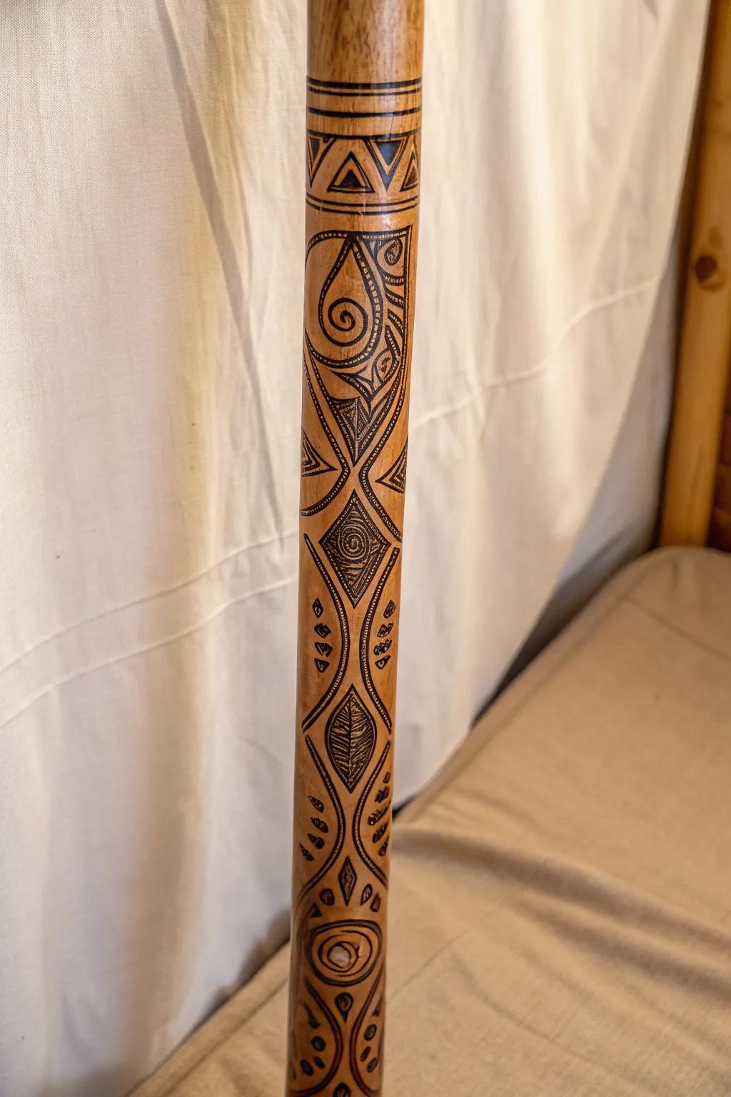 Uncover the artistry of walking with this exquisitely crafted stick, where indigenous patterns converge with minimalist elegance.