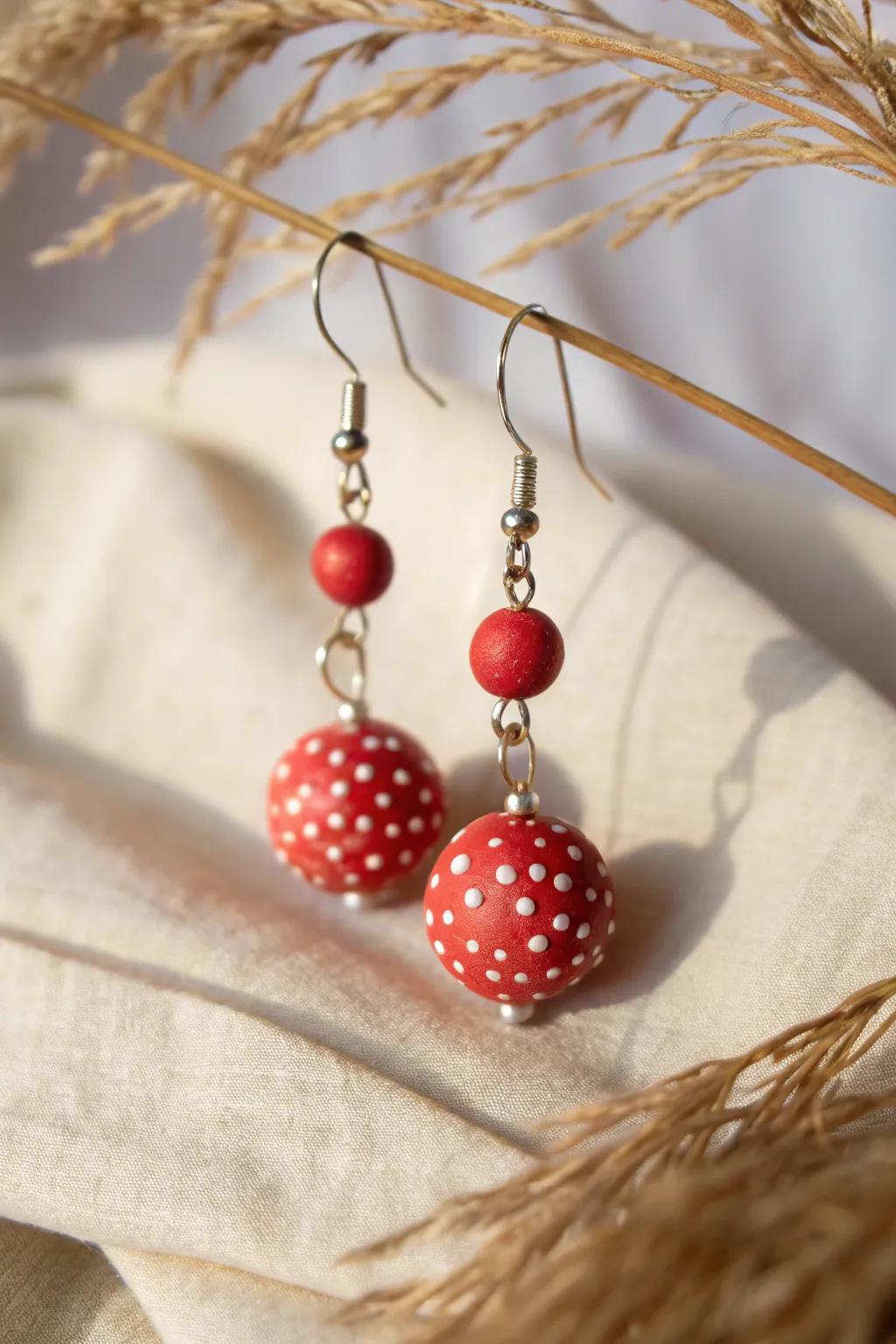 Incorporate a touch of whimsy to your style with these charming polka-dotted clay bead earrings.