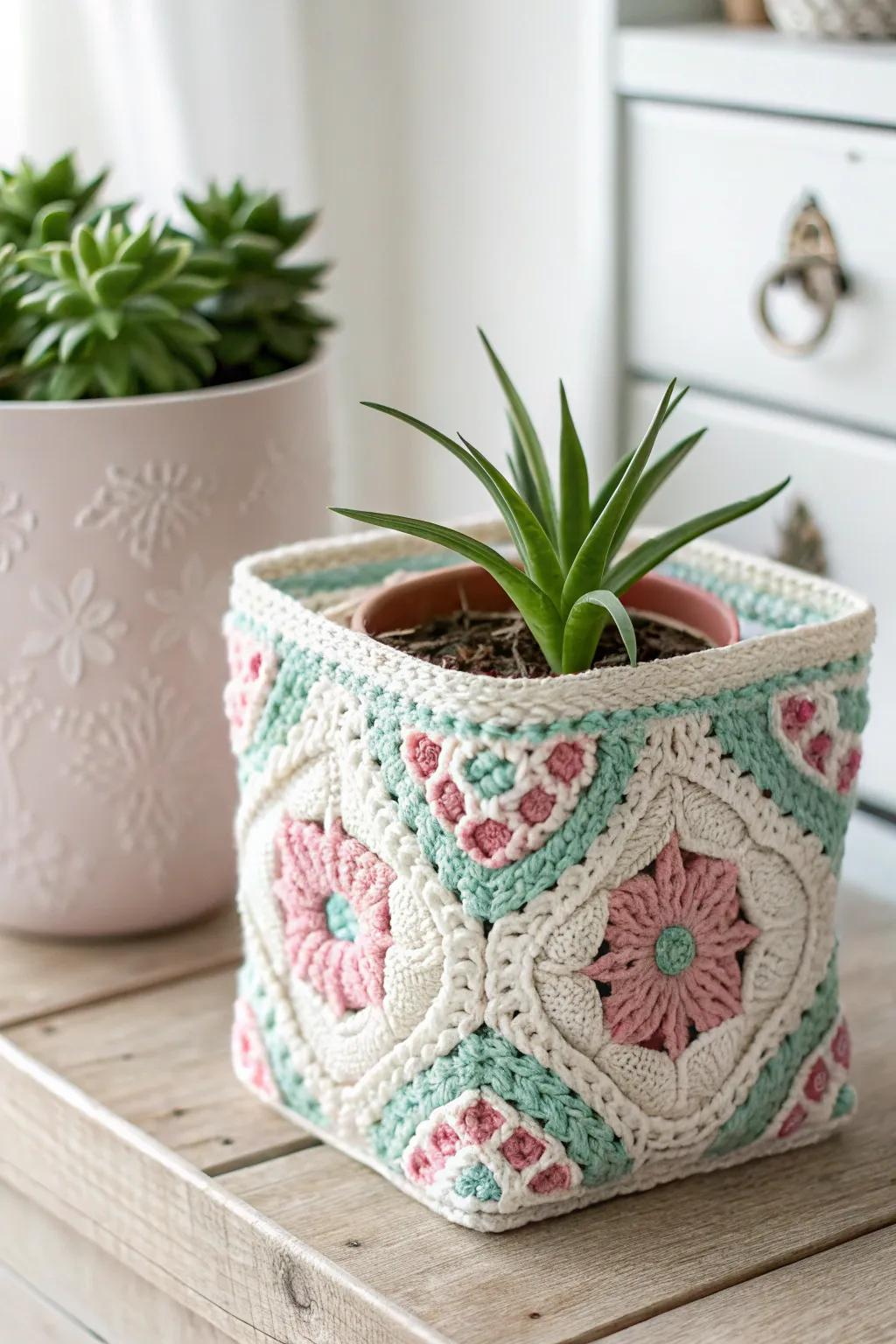 Introduce a hint of color and craftsmanship to your vegetation with a granny square floral vessel covering.