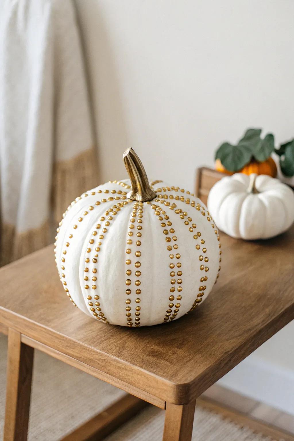 Elevate your pumpkin game with this chic, studded masterpiece—perfect for a touch of glam at the contest!