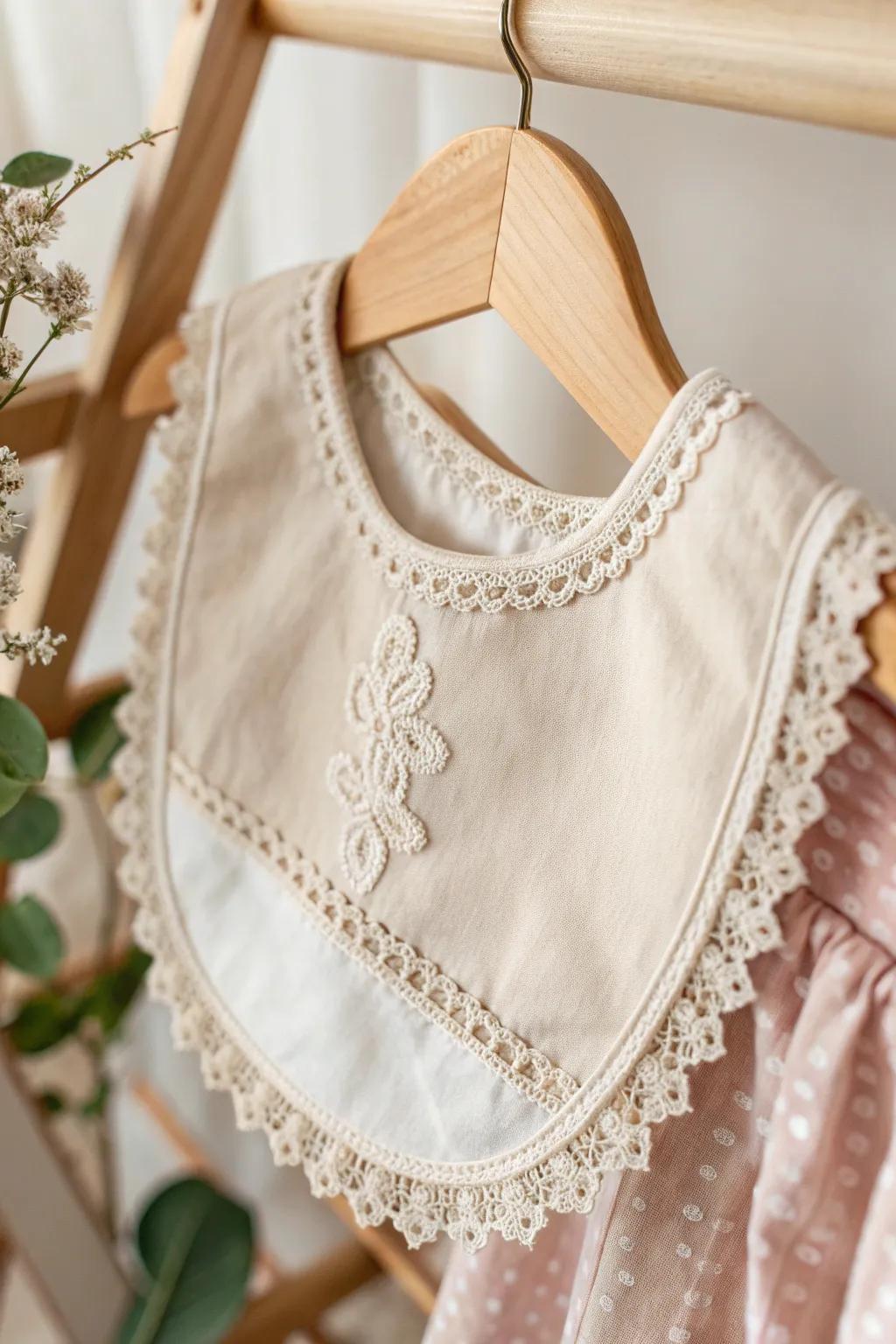 Transform infant essentials into heirlooms with aged needlepoint details. #Craftsmanship #MinimalistBeauty