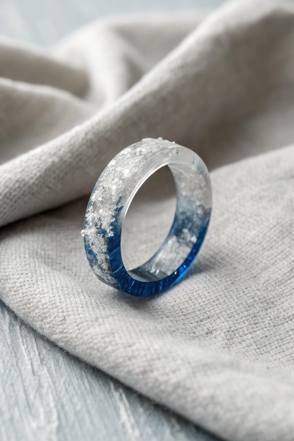 Embrace the elegance of winter with this frosted resin ring, where simplicity converges with stunning skill.