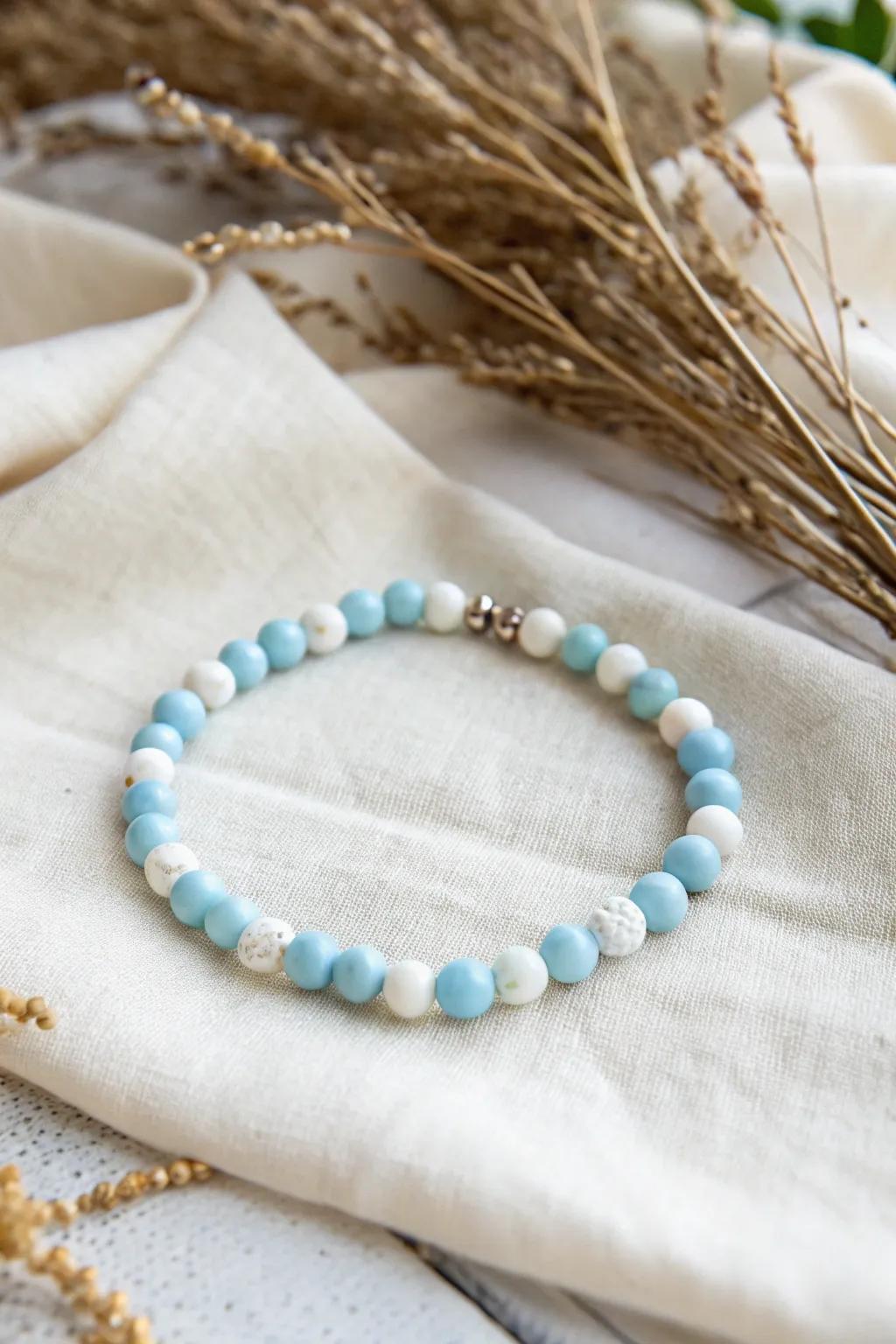 Embody the serene allure of the heavens with this artisanal clay bead bracelet, a personalized ray of sunshine for your wrist.