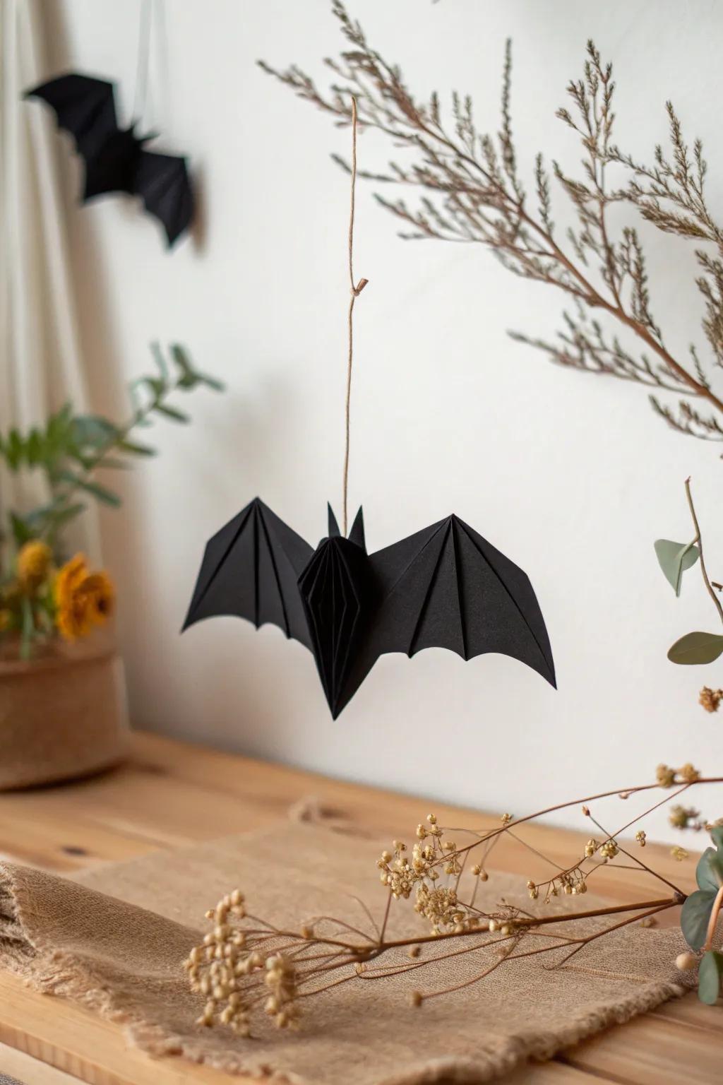 Elevate your Halloween aesthetic with minimalist grace: an artisanal paper bat that embodies the essence of eerie simplicity.