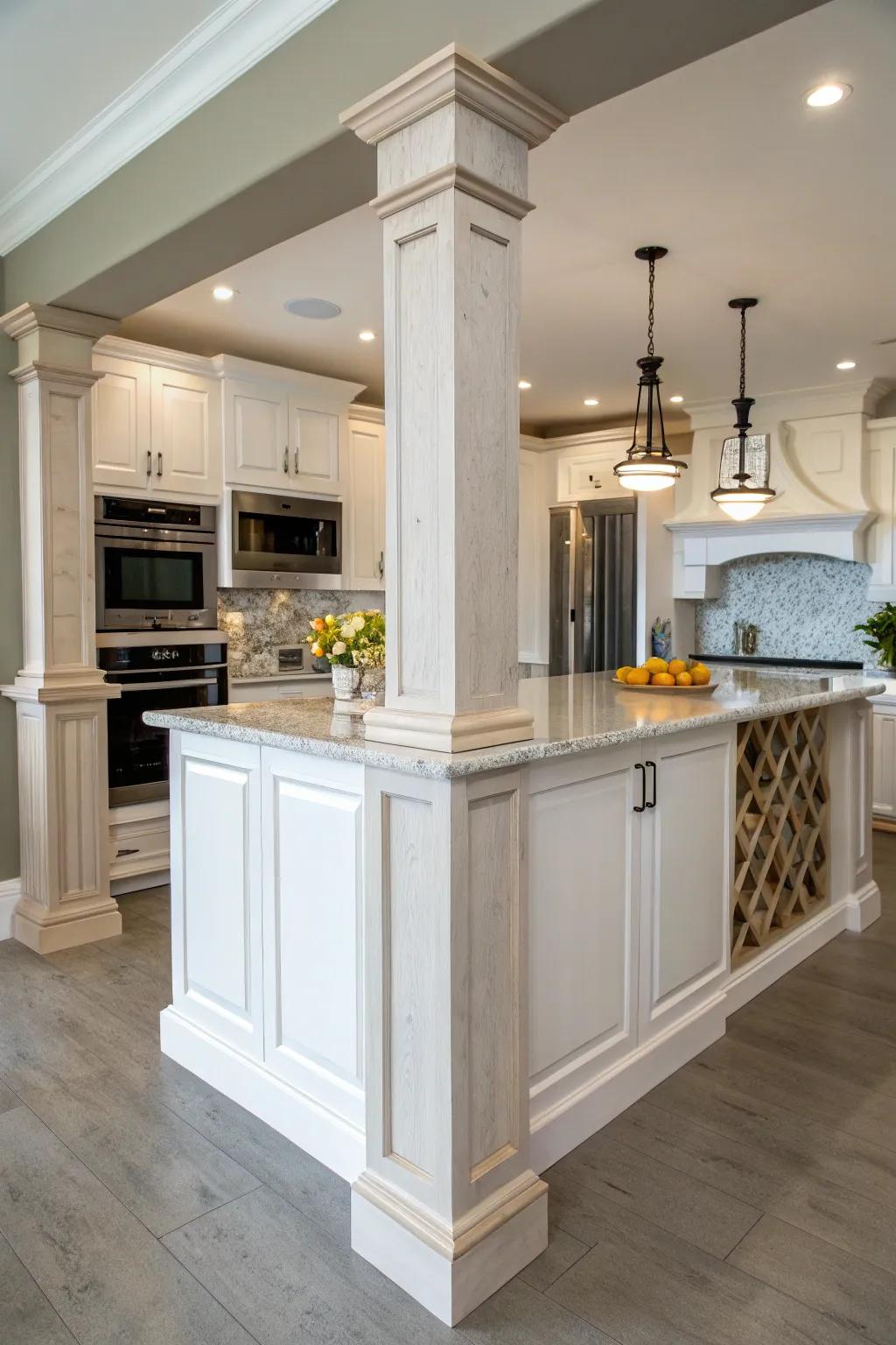 A well-balanced kitchen design showcasing matching pillars that frame the island.