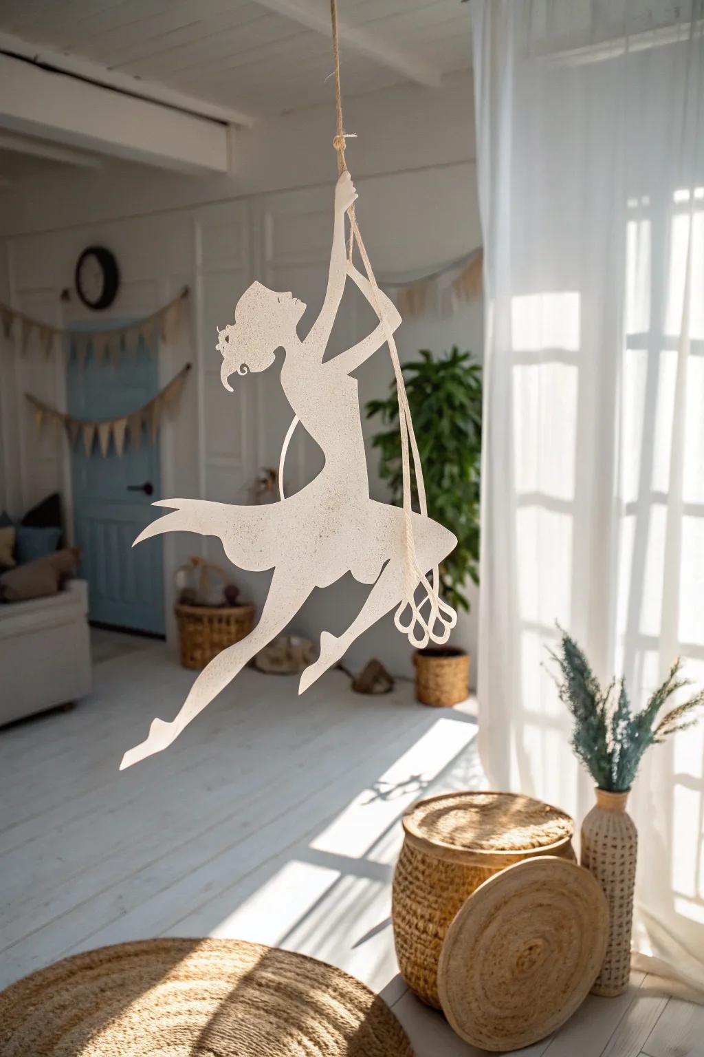 Elevate your space with the whimsical allure of handmade aerialist paper figurines, where simplicity intertwines with artistry in every graceful sway.