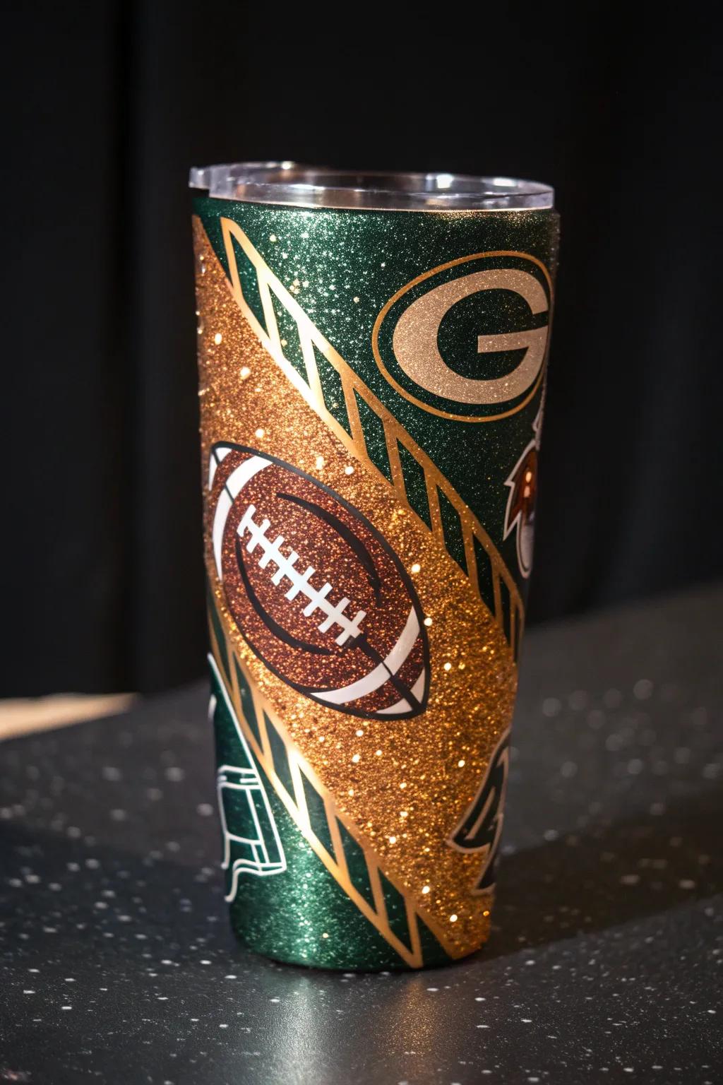 Inject a hint of glamour into your game day with this shimmering football tumbler!