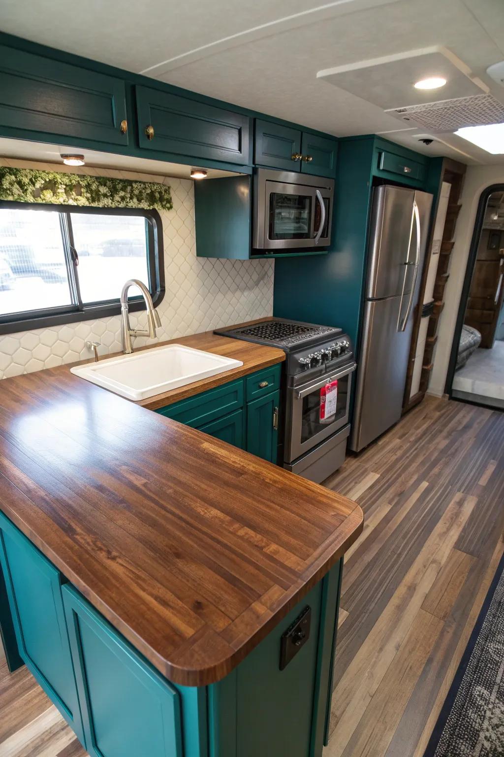 Turn your small fifth wheel cooking area into an opulent space with warm wood shades and contemporary appliances.