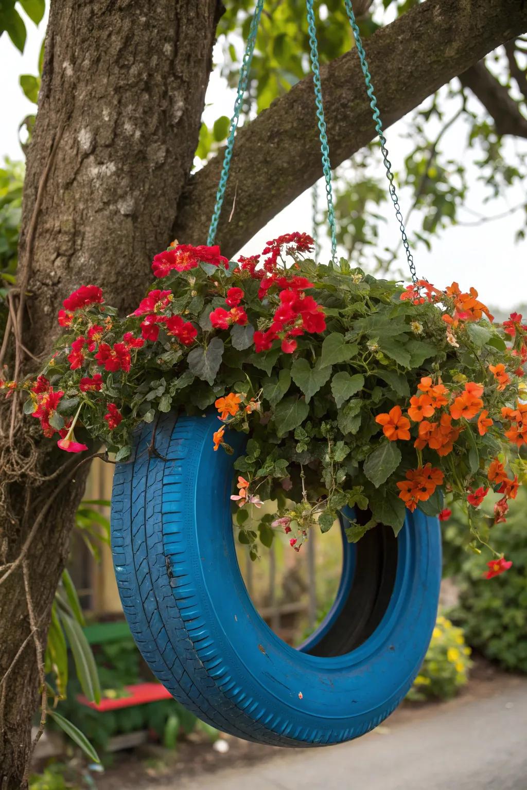 Enhance your garden with this eye-catching suspended tire planter and let nature’s chandelier light up!