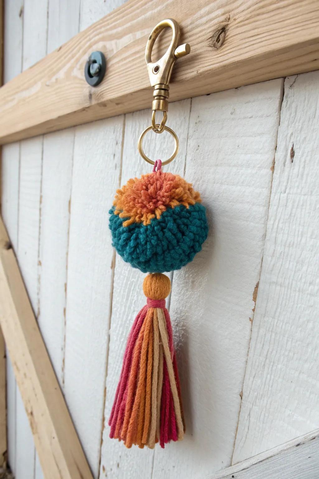 Introduce a burst of color and craftsmanship to your everyday essentials with a vibrant pom pom key charm. 🌈🔑 #ScandiBoho #PomPomLove