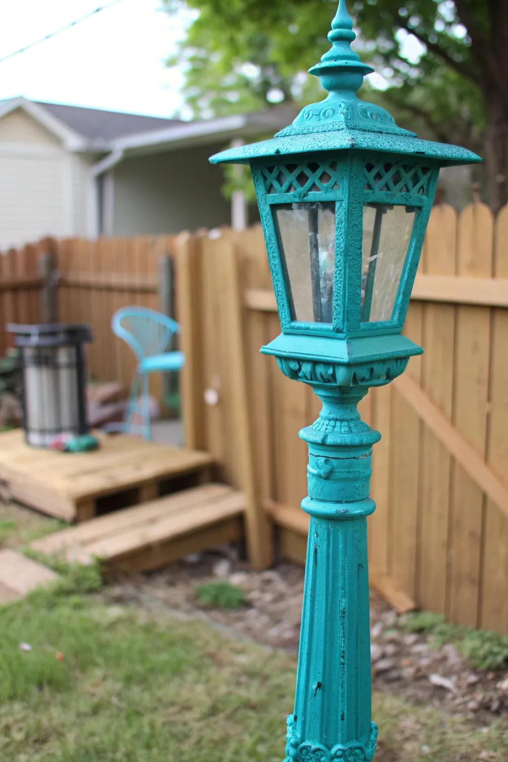 Light up your space with a striking blue-green change: the skill of painting your lamp post.